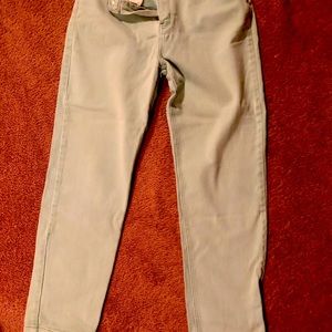 Pale green women’s jeans. 14 A